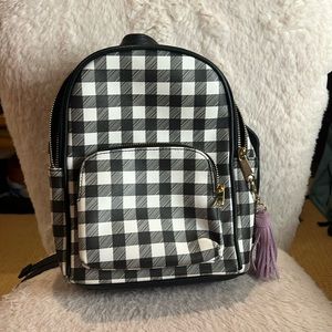 From Claire’s. Mini. With detachable. purple keychain.